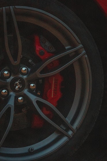 black and red car wheel