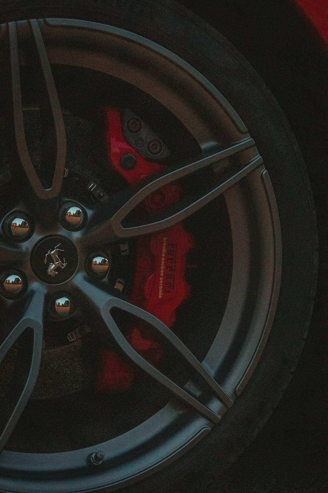 black and red car wheel