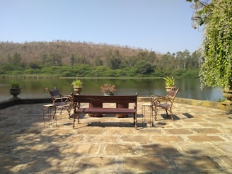 A serene outdoor setting with a designer contemplating ideas.