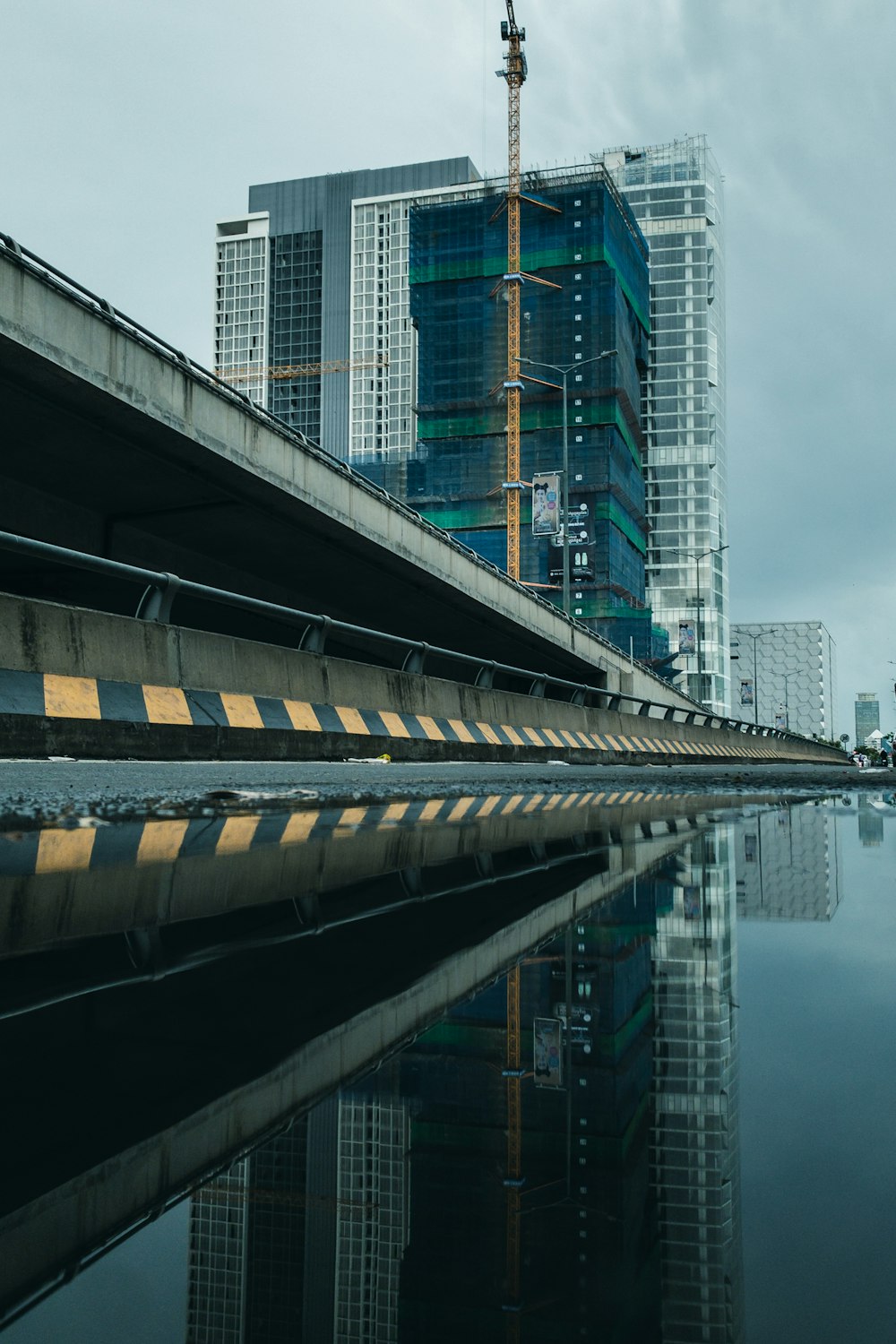 gray concrete bridge over river