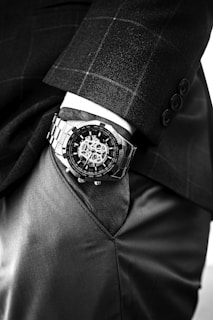 black and silver round chronograph watch