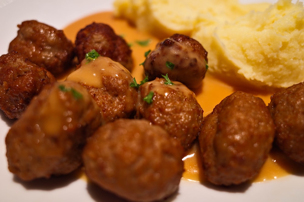 fried meat on white ceramic plate