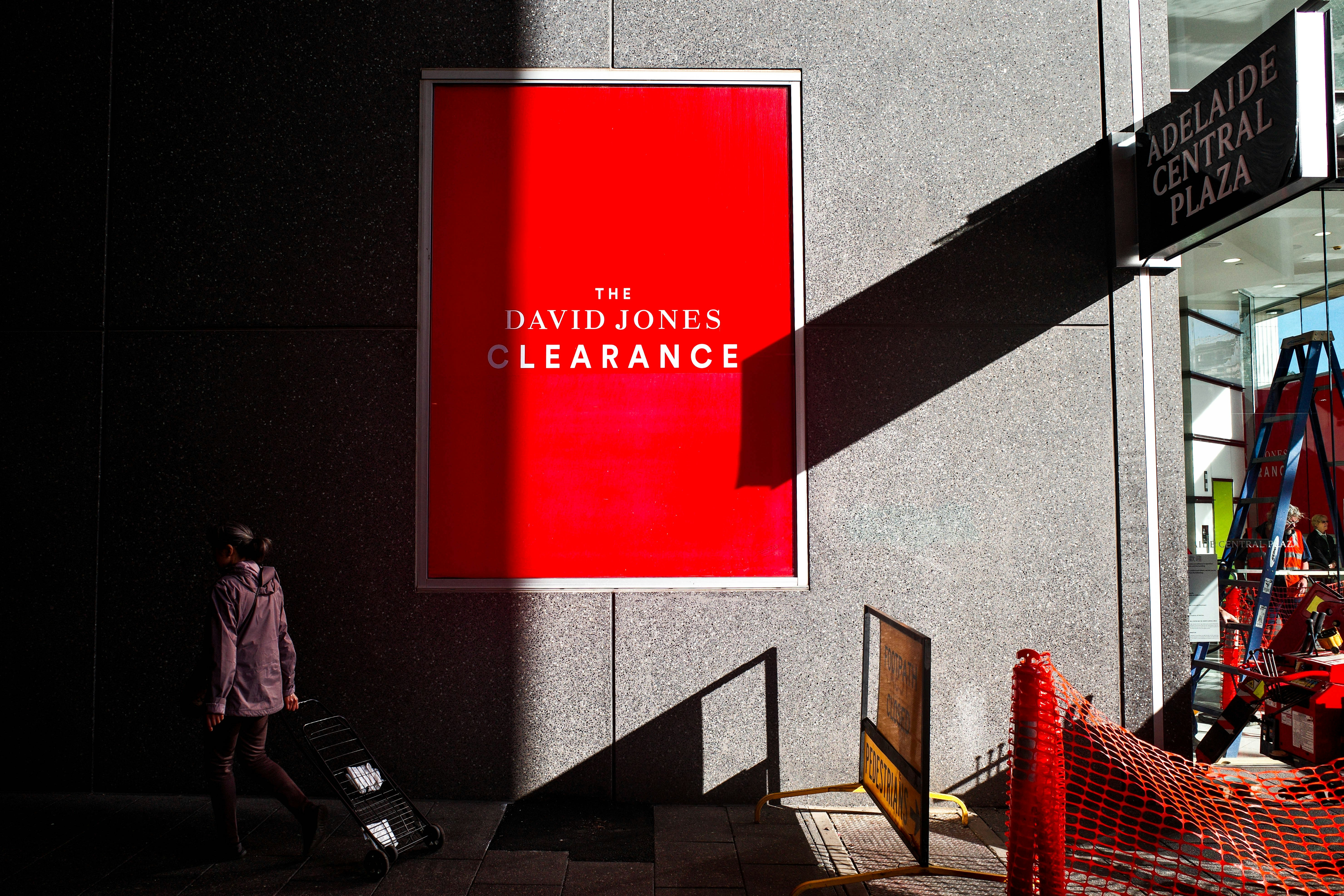 red and white wall mounted poster