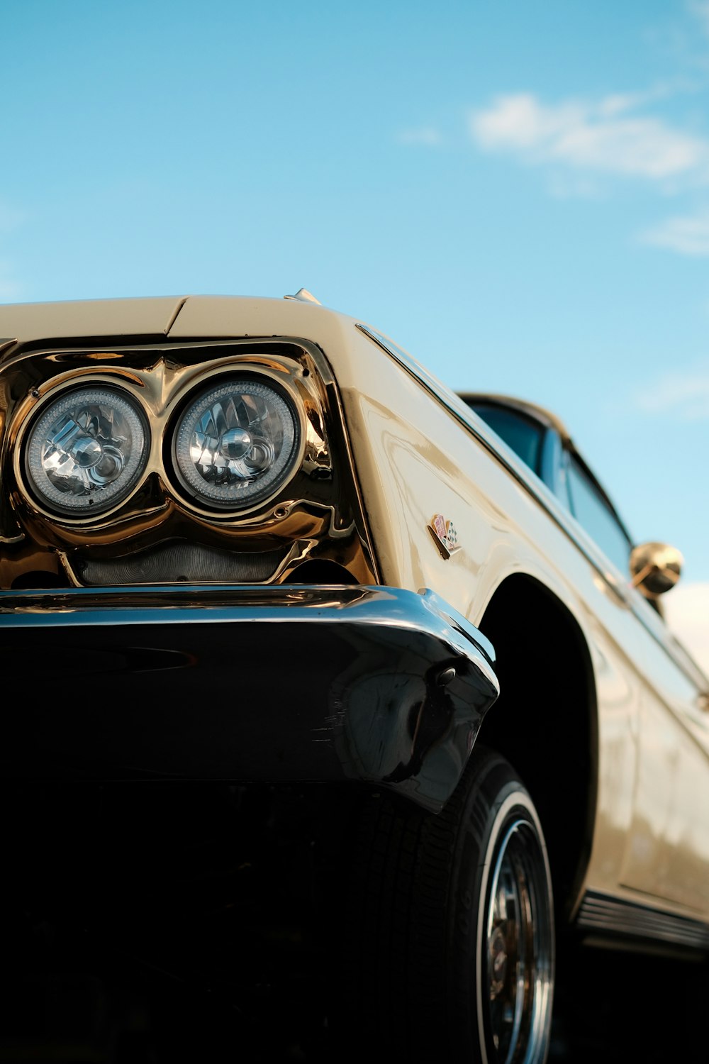 blue and white car in close up photography