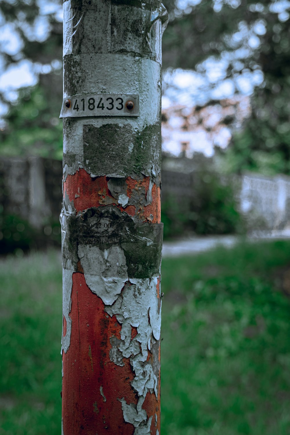 red and white wooden post