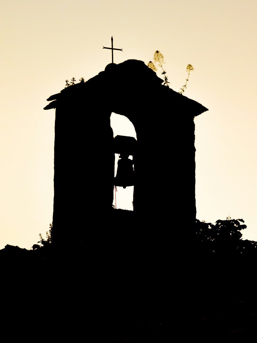 silhouette of a person standing on a building