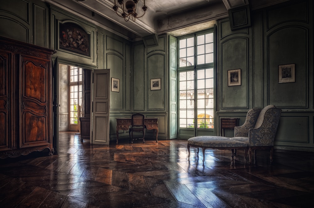 living room with brown wooden floor and white wooden door