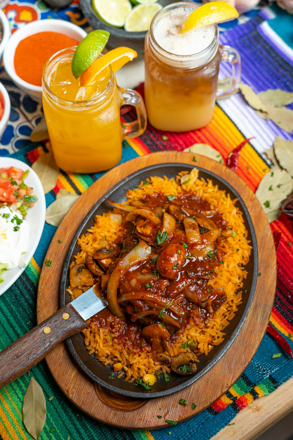 brown wooden round plate with cooked food