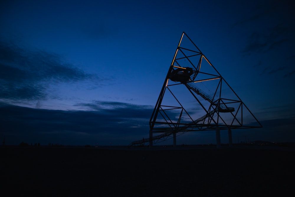 black and white basketball hoop under blue sky