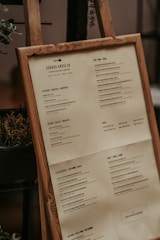 white printer paper on brown wooden table