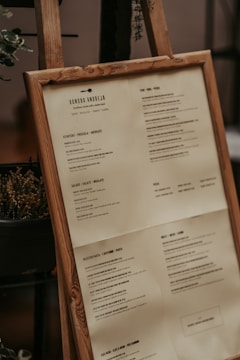 white printer paper on brown wooden table