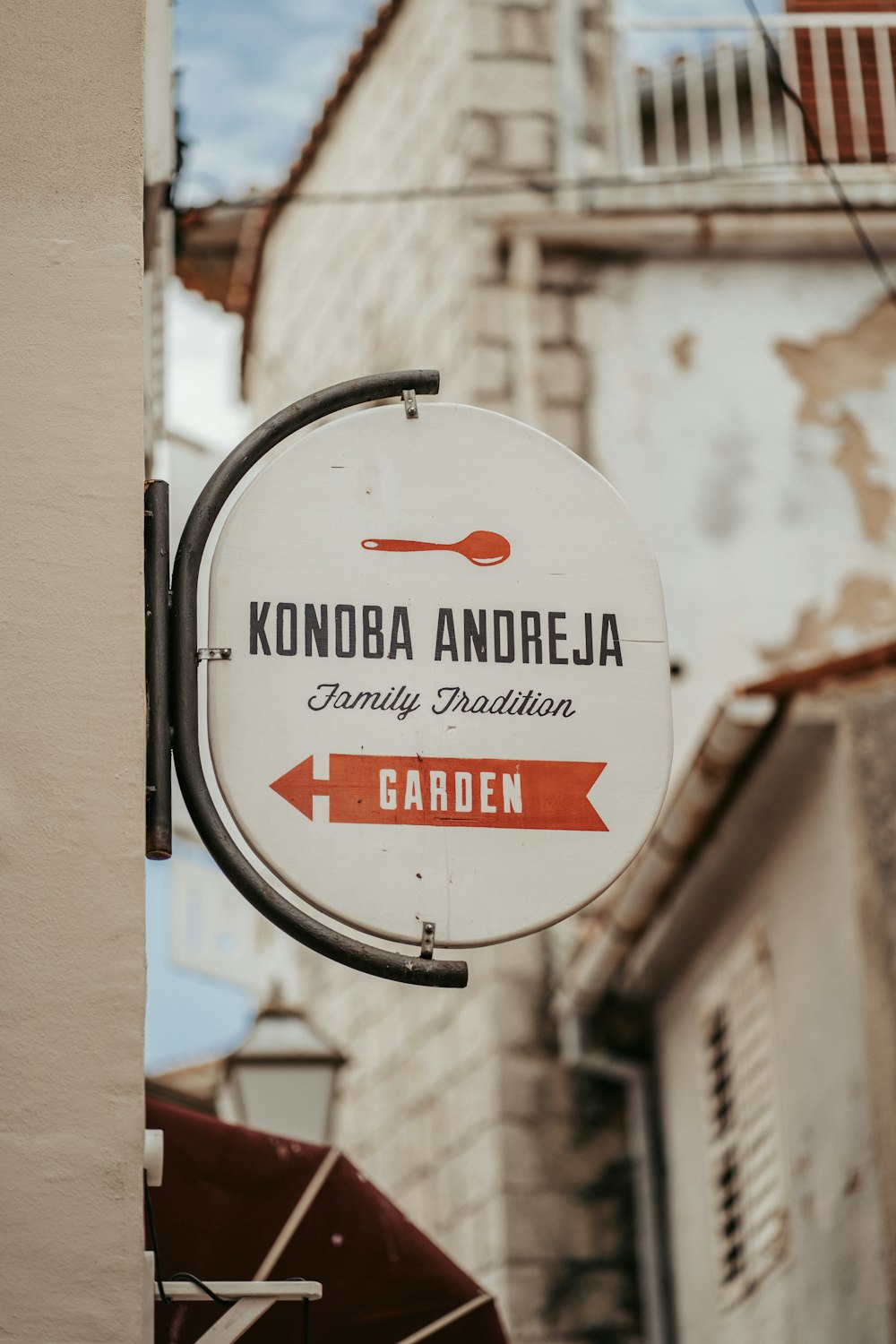 white and red round signage