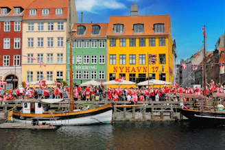 people riding on boat on river during daytime