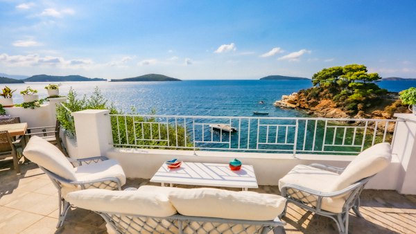 White and brown boat on sea during daytime — Skiathos, Greece