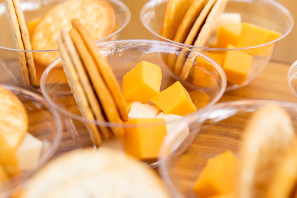 sliced mango in clear glass bowl