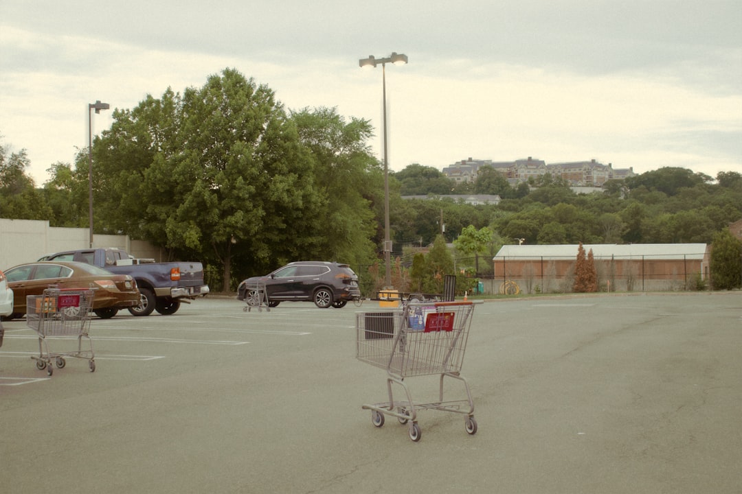 cars parked on parking lot during daytime