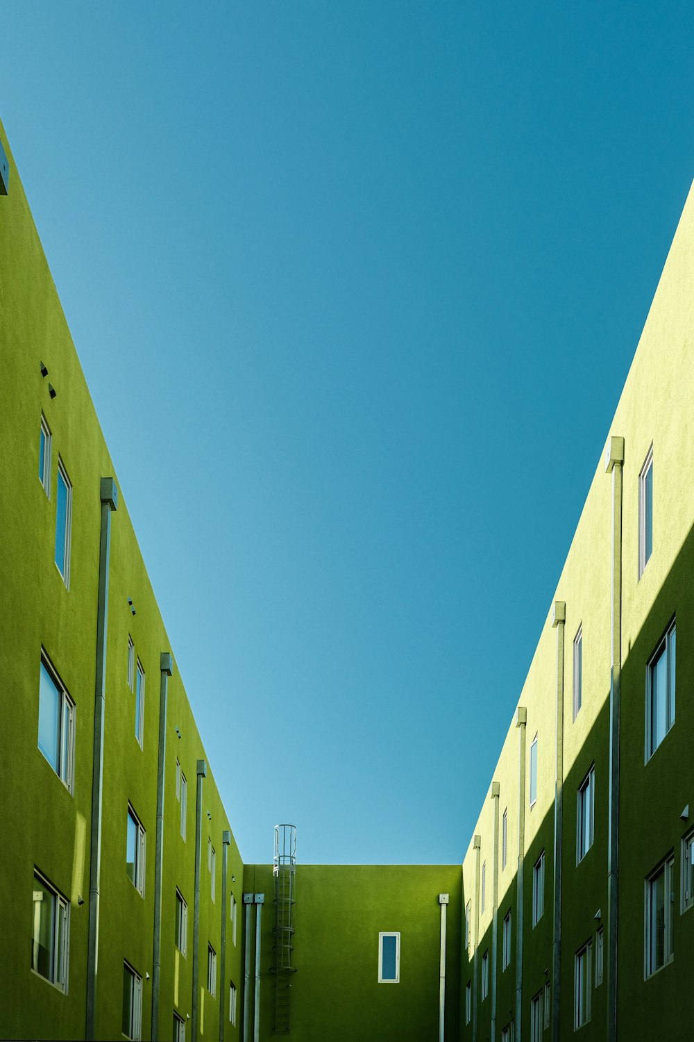 brown concrete building under blue sky during daytime