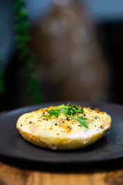 yellow and brown pastry on blue ceramic plate