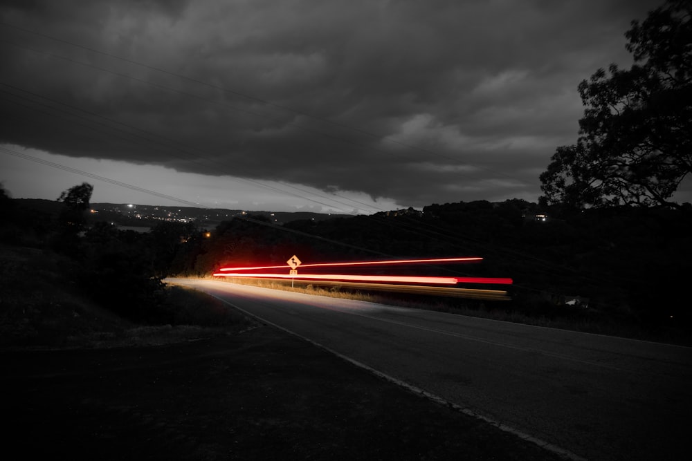 time lapse photography of road during night time