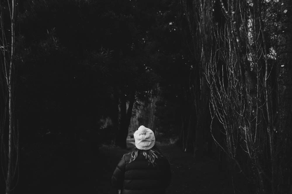 grayscale photo of man and woman kissing