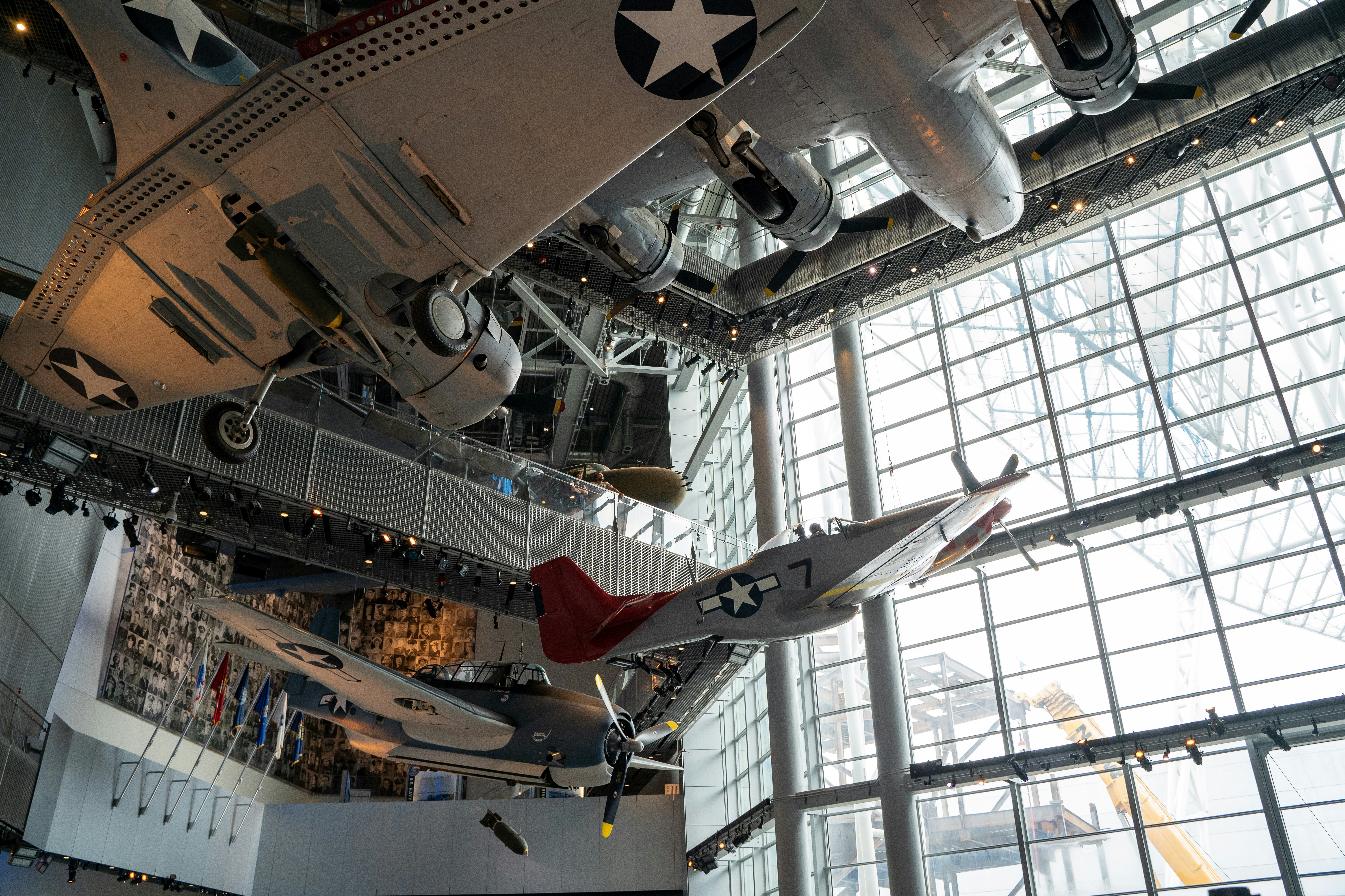 gray and red fighter plane, airplane hanger in the National World War II Museum in New Orleans, Louisiana