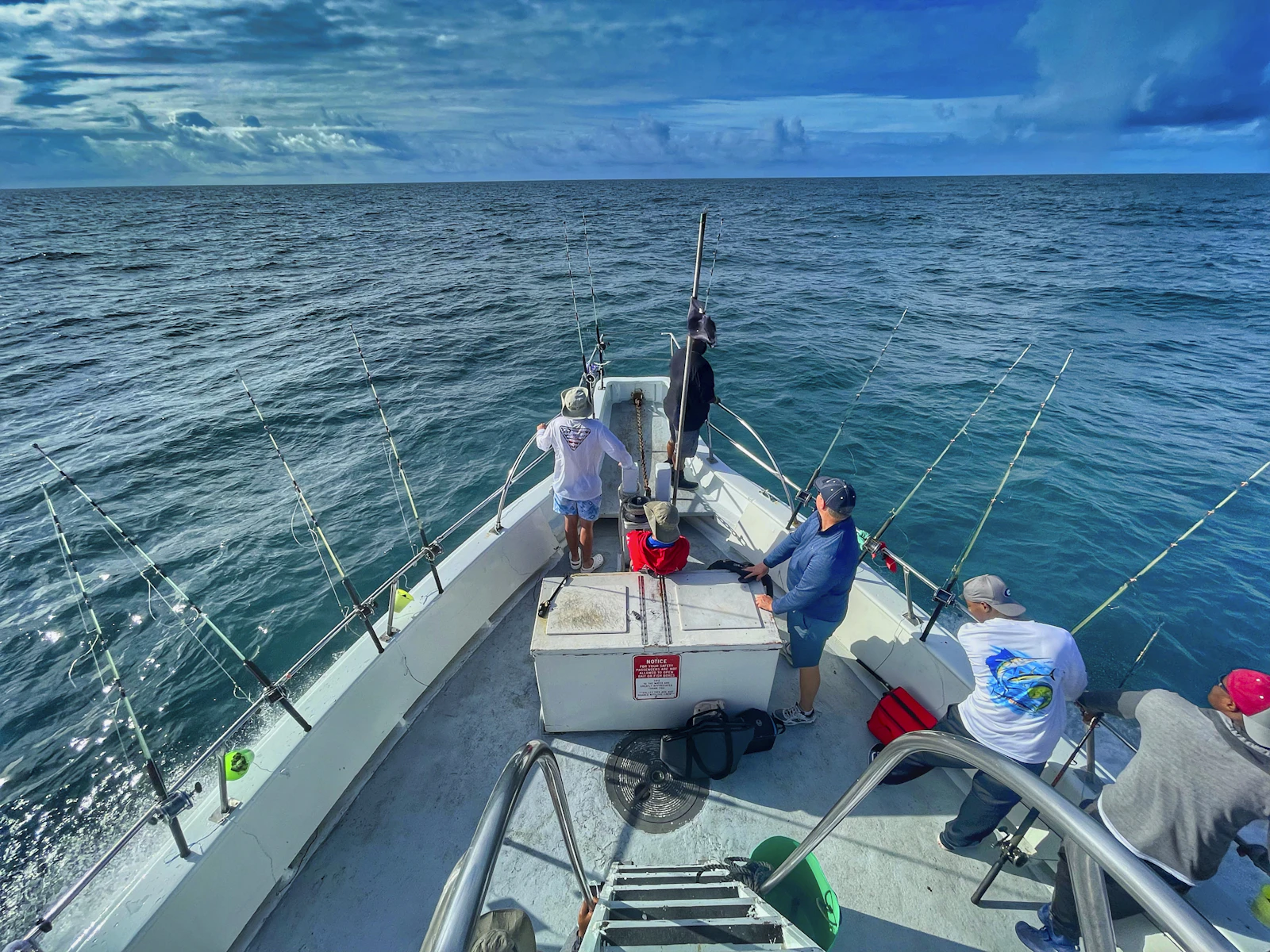 Group of anglers out on a deep-sea fishing charter