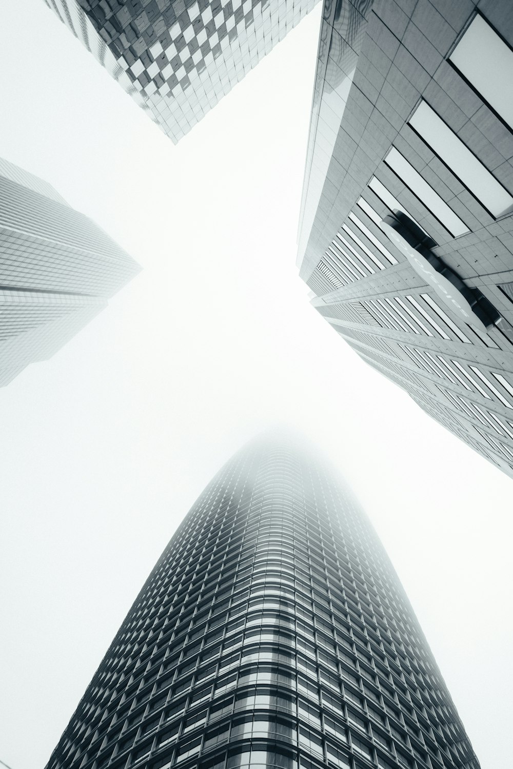 low angle photography of high rise building