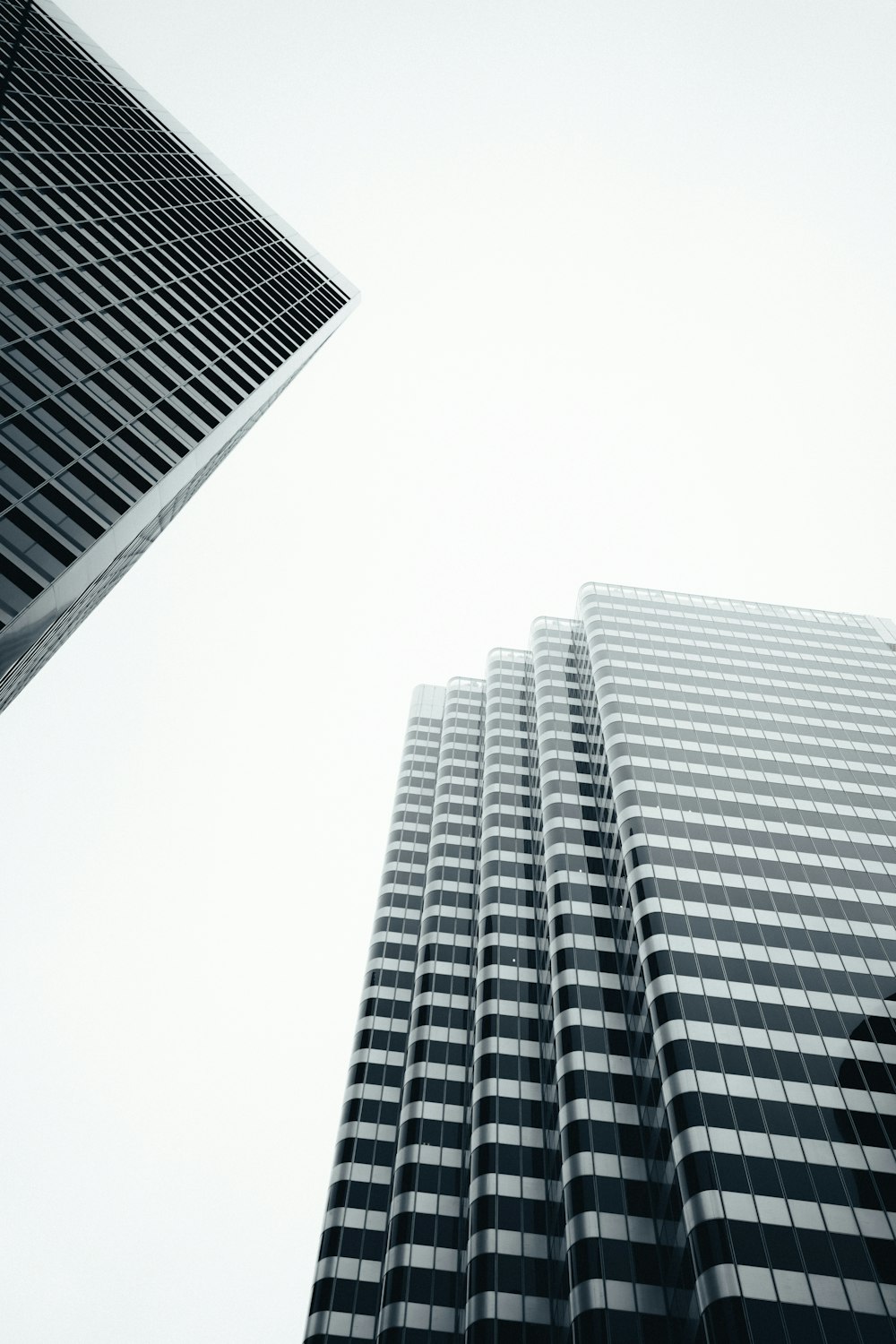 low angle photography of high rise building