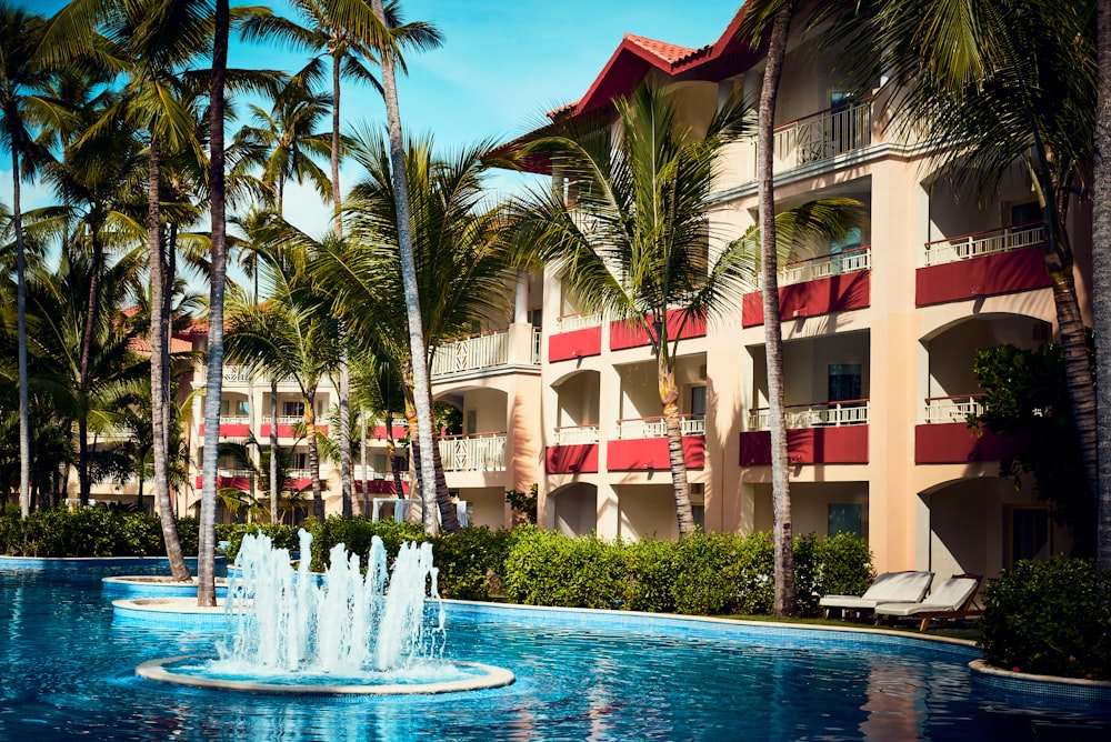 outdoor fountain in front of building during daytime