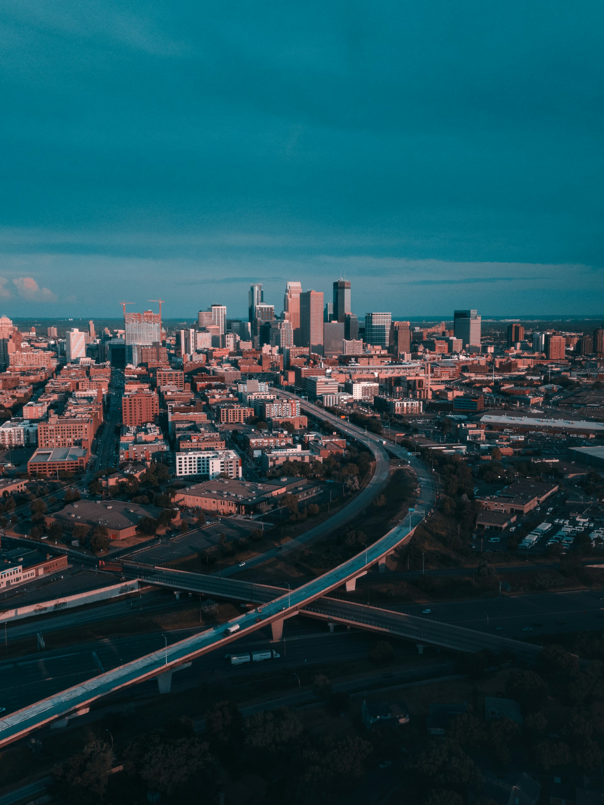 city buildings under blue sky during daytime