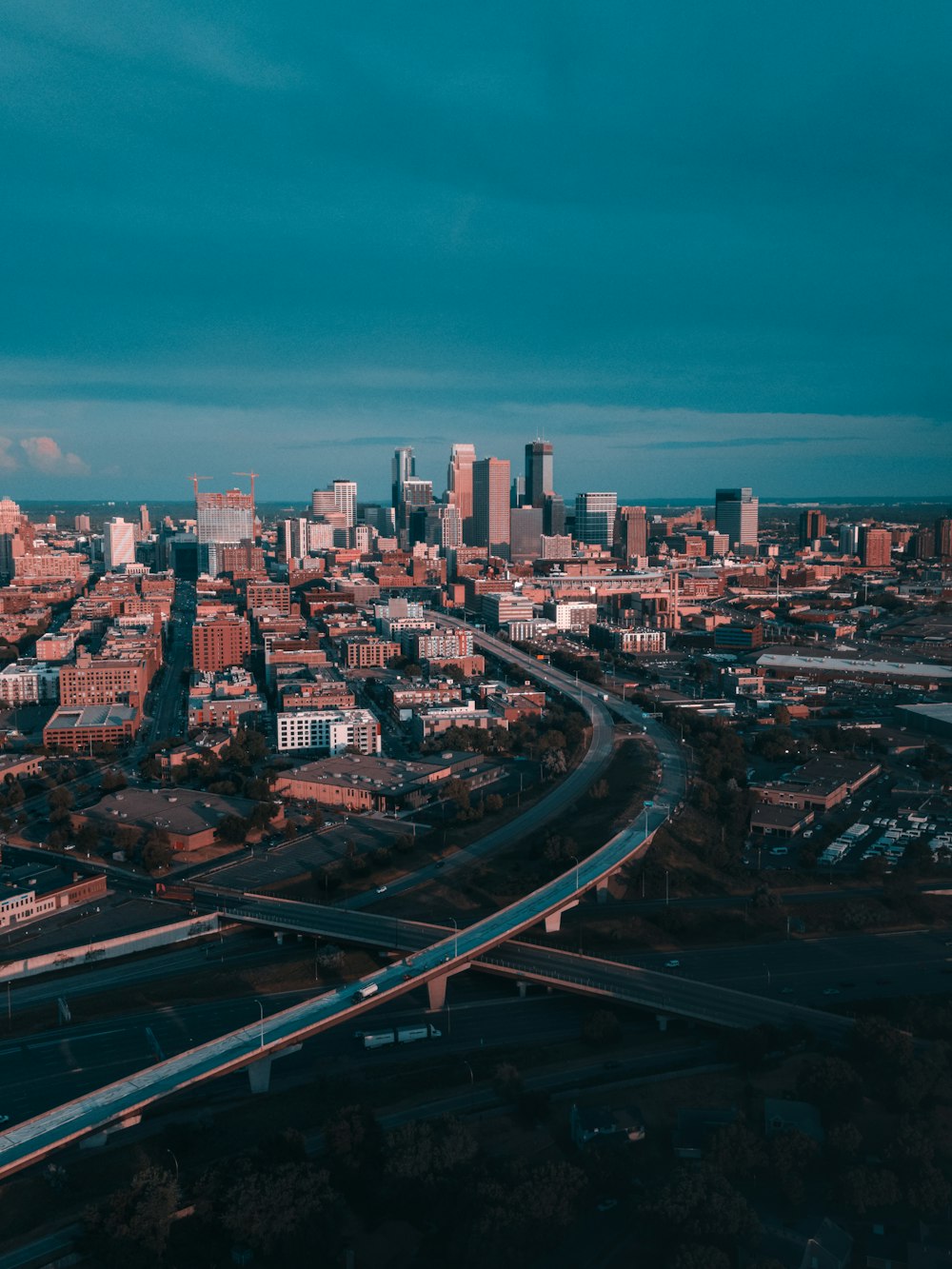 city buildings under blue sky during daytime