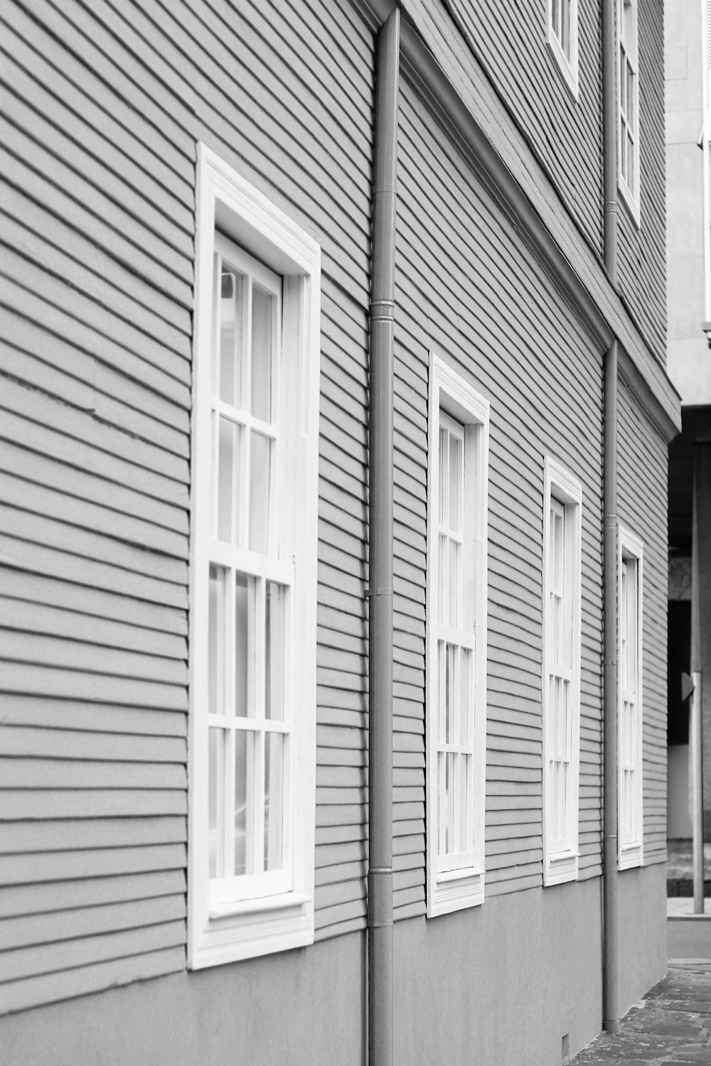 grayscale photo of wooden door