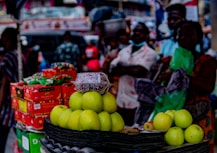 green apples on black plastic basket