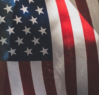 us a flag on white and red textile