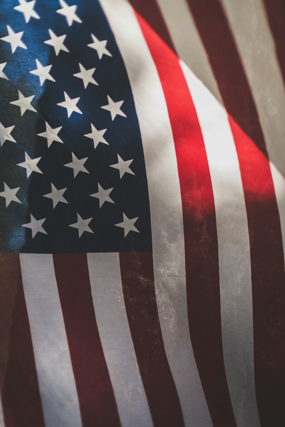 us a flag on white and red textile