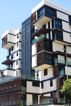 white and brown concrete building during daytime