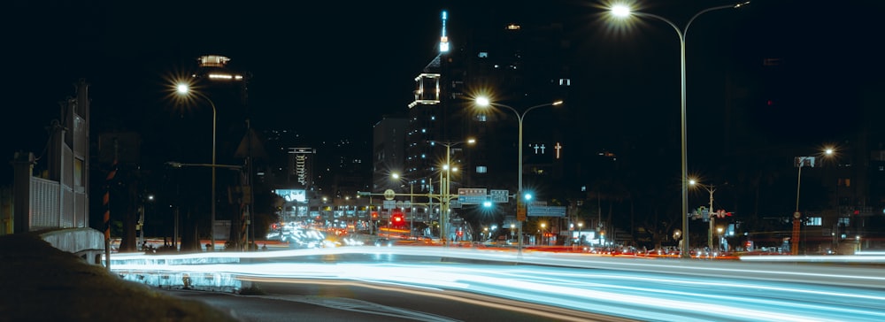 time lapse photography of cars on road during night time