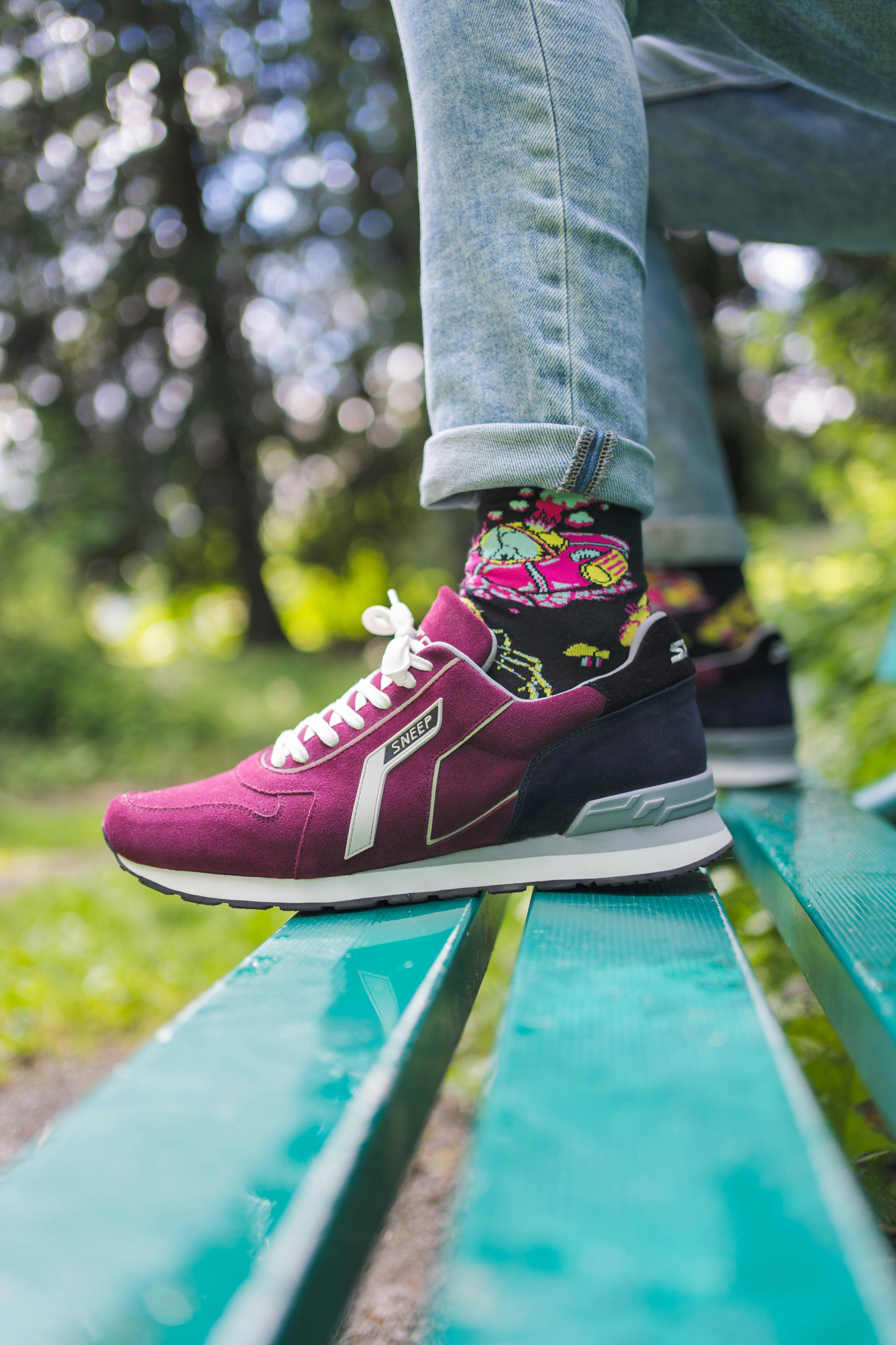 Person in rosa Nike Sneakers