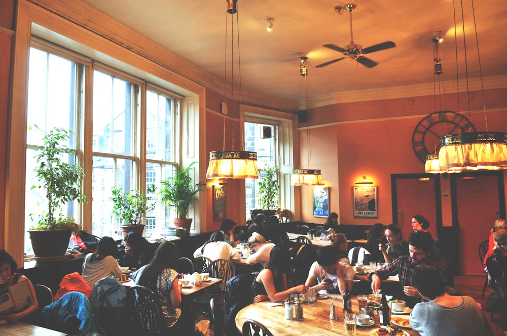 people sitting on dining table