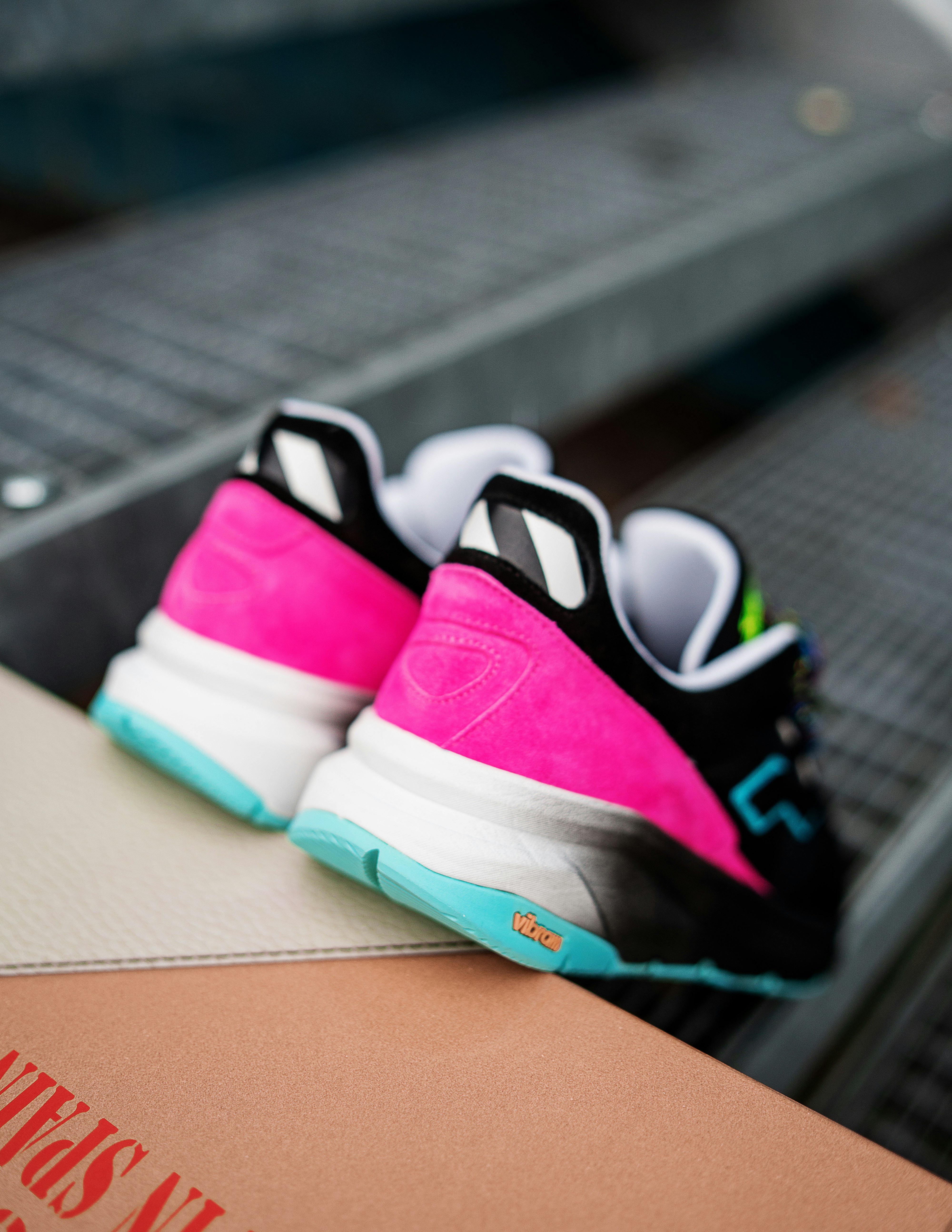 pink black and white nike athletic shoes