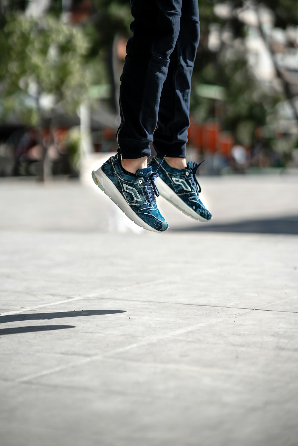 white and green nike athletic shoes on brown and black rock photo – Free  Sneaker Image on Unsplash