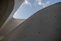 white concrete building under blue sky during daytime