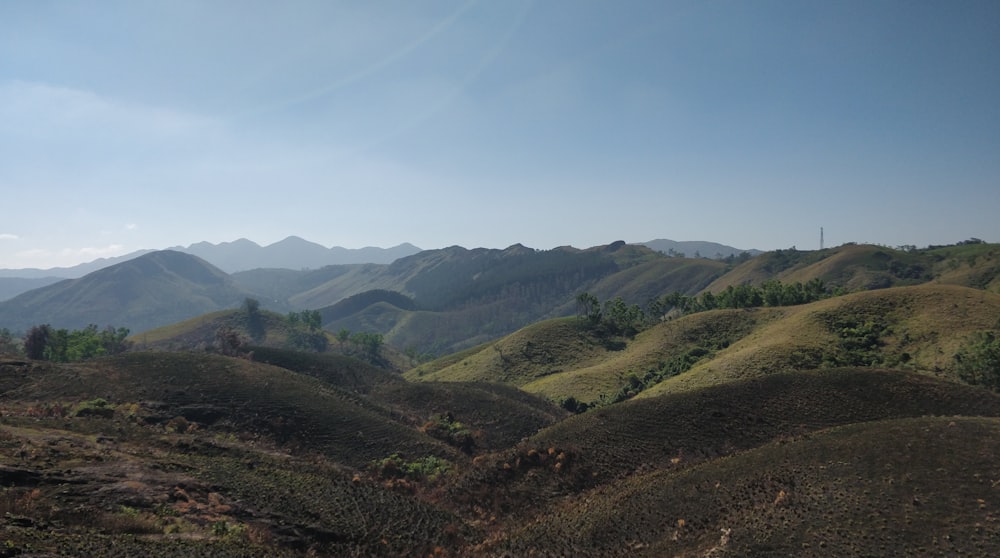 green mountains under blue sky during daytime