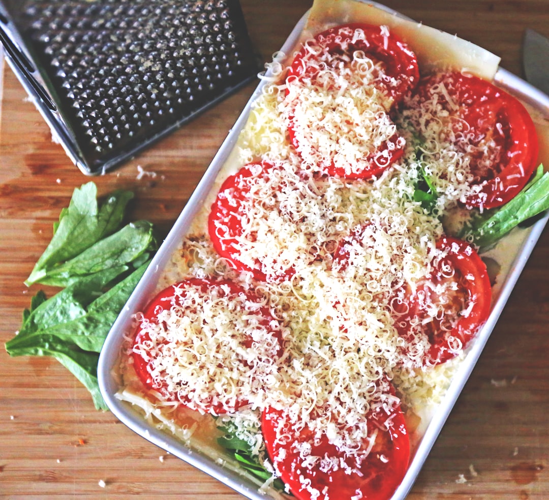 red and yellow food on white plastic container