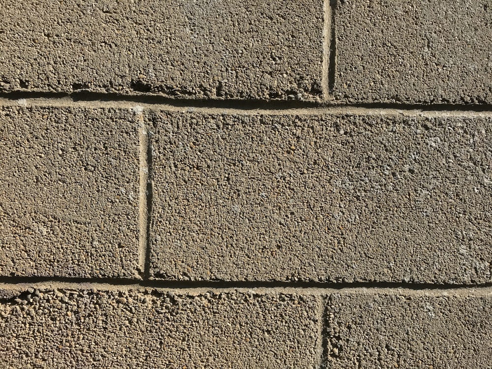 brown and gray brick wall