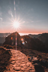 sun setting over the mountains