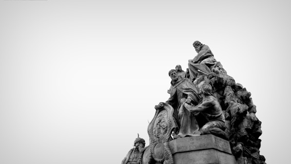 gray concrete statue of man