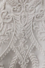 white floral lace textile on brown wooden table