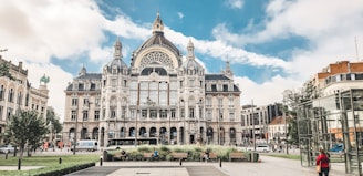 white and brown concrete building under blue sky during daytime