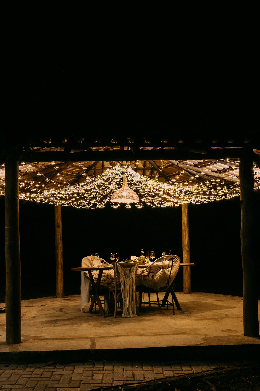 brown wooden canopy with white and brown canopy tent